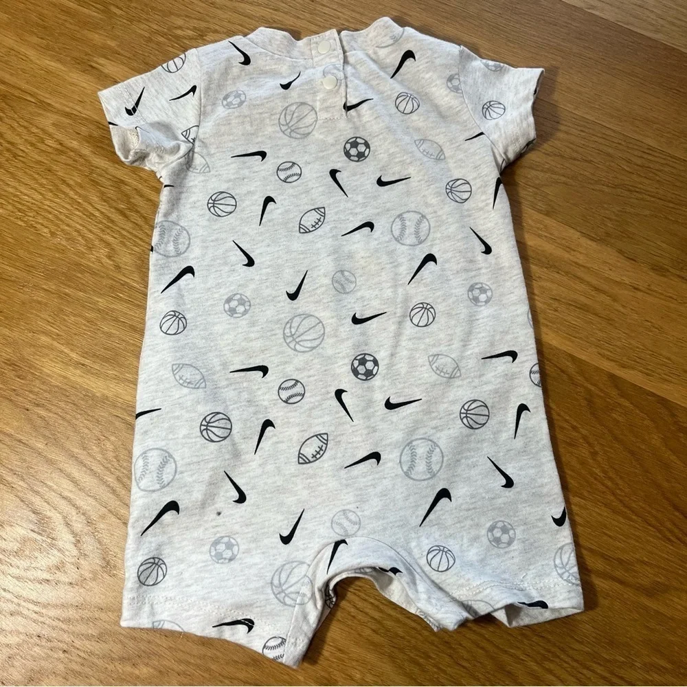 Nike Cream and Black Bodysuit with Short Sleeves and Sports Print